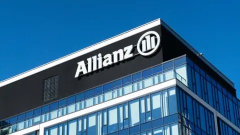 Getty Images A stock image of the Allianz logo on its building in Poland
