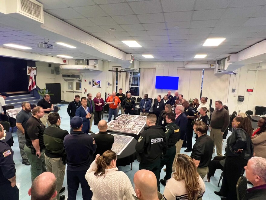 Mike Rodgers, CEO of Critical Response Group, leads a tabletop training exercise with staff.