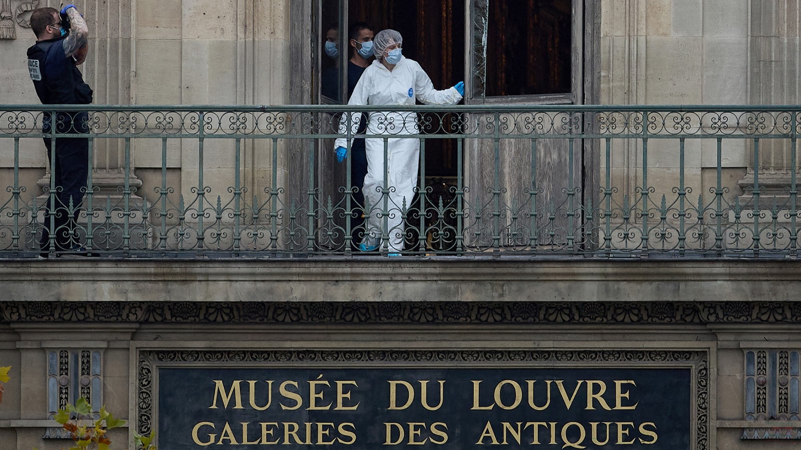 Investigators at the Louvre